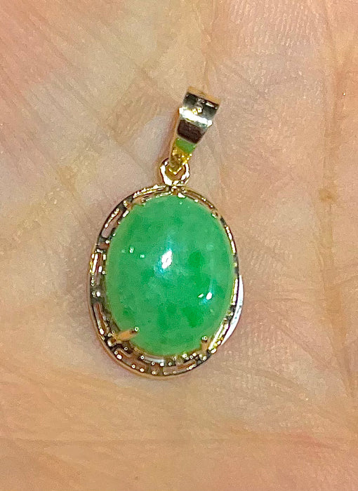 JADE PENDENT WRAPPED IN 14k REAL GOLD