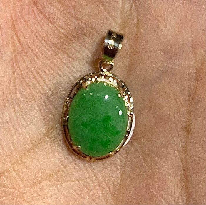 JADE PENDENT WRAPPED IN 14k REAL GOLD