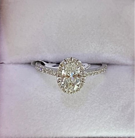 White Gold 14k Ring Oval Cut Diamond (in the center) & Diamond Halo (.94ct total) Pavé style